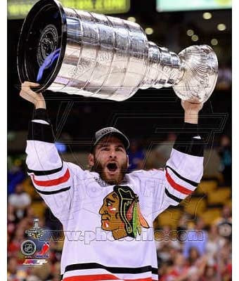 Brandon Saad Chicago Blackhawks 2013 Stanley Cup Champions Raising Of The Cup Photo (Size: 8X10) product image 1, provided