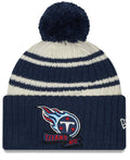 Tennessee Titans New Era Navy 2022 NFL Sideline Sport Pom Cuffed Knit Hat product image 1, provided for visual reference and