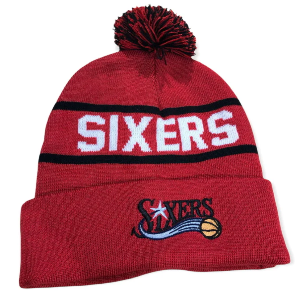 Philadelphia 76ers Mitchell & Ness NBA Reload 2.0 Red Cuffed Pom Knit Hat product image 1, provided for visual reference and