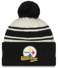 Pittsburgh Steelers New Era Black 2022 NFL Sideline Sport Pom Cuffed Knit Hat product image 1, provided for visual reference